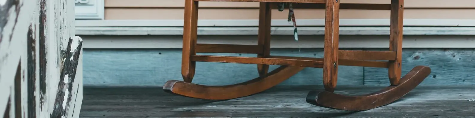 Rustic Rocking Chair on Urban Patio Background